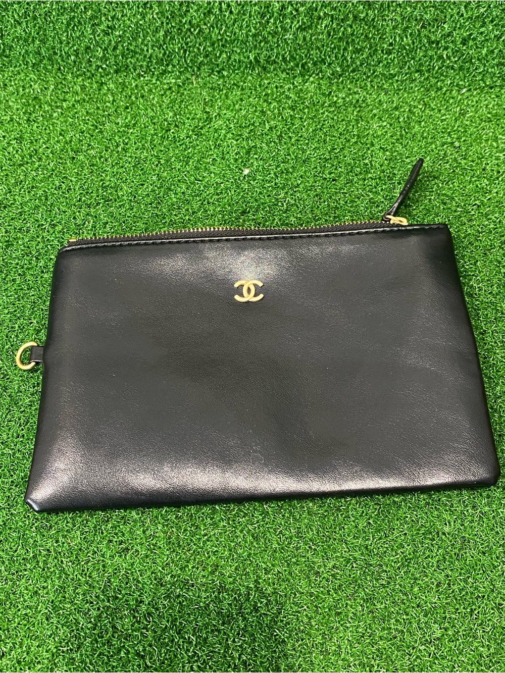 CHANEL Black Leather Zip Pouch with Gold CC Accent 8.5”x6”
(Sep 026)